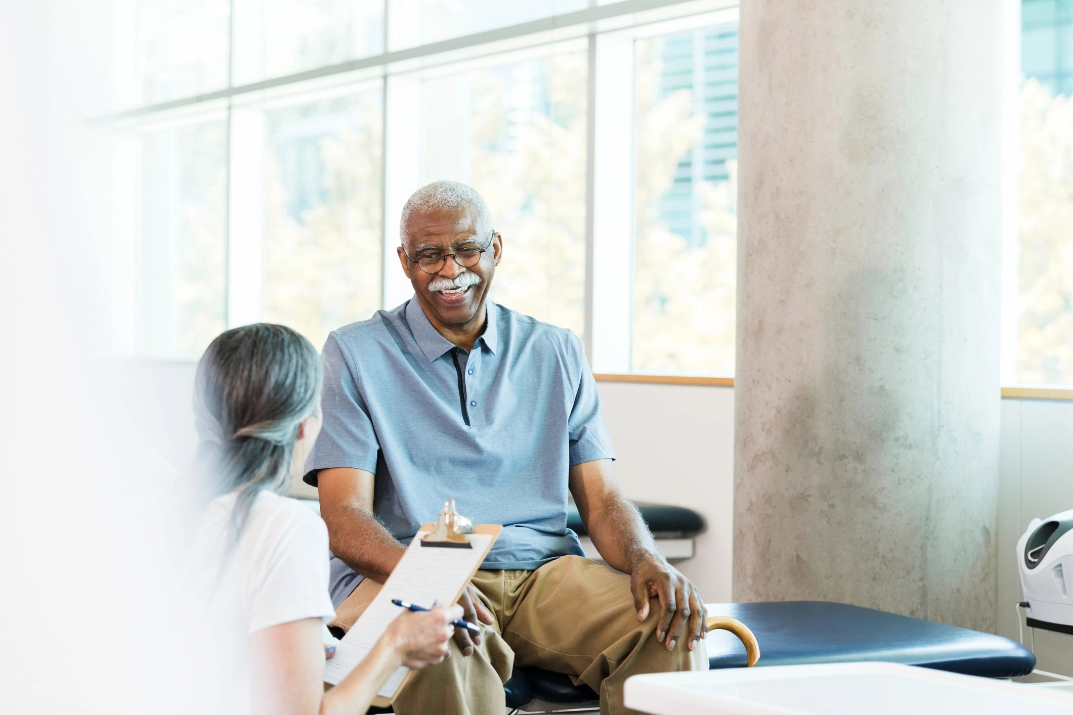 Healthcare consultation with a senior adult