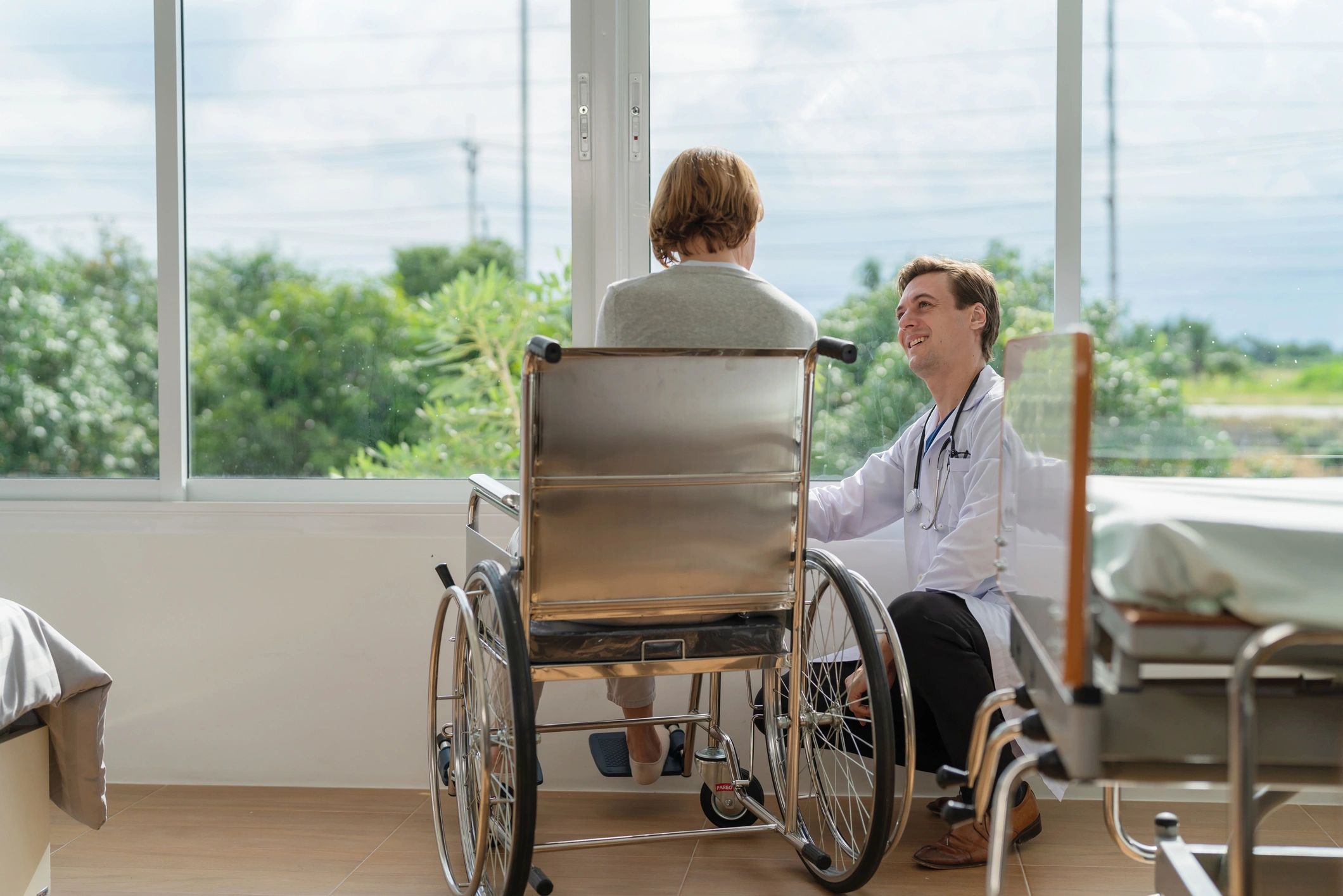 Caregiver supporting an older adult at home